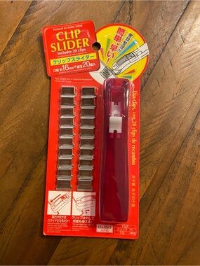 Japan brand clipper slider set reusable plastic dispenser and 20 metal clips.